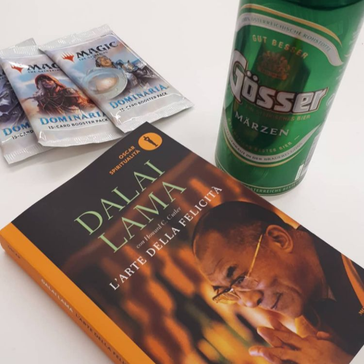 3 Magic boosters, a beer and a book by the Dalai Lama