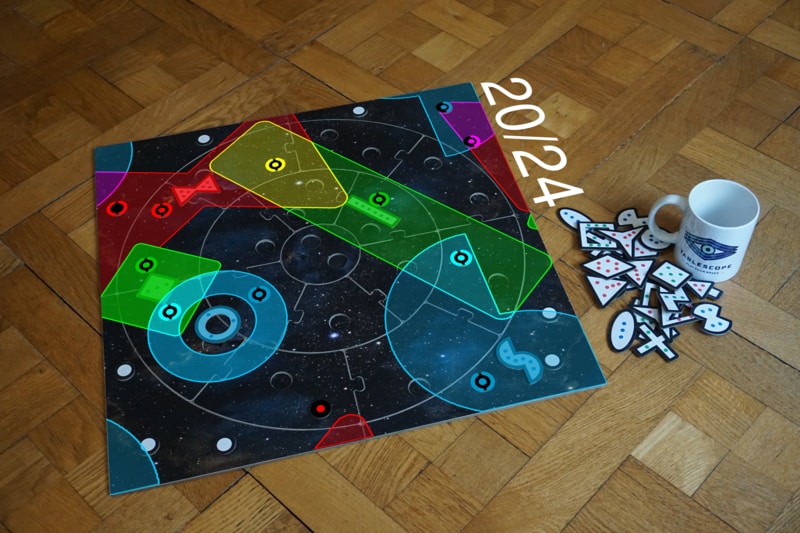 A board game set in space in which some figures have been made larger via an augmented reality overlay